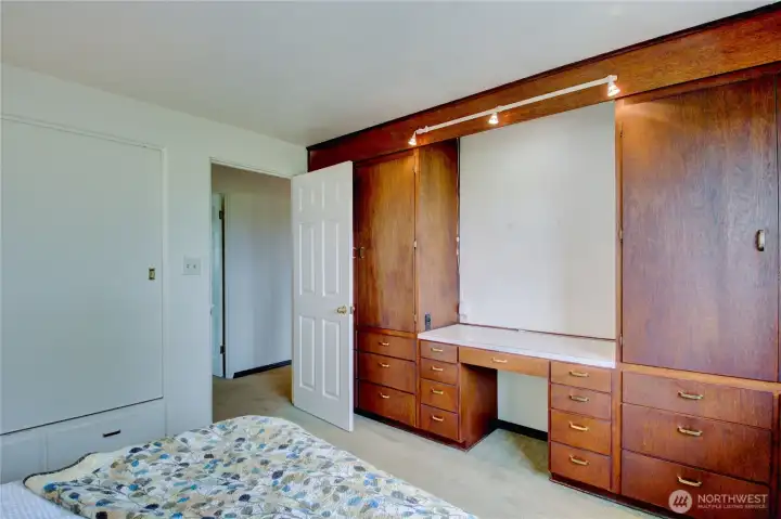 Main bedroom with built in storage. Main bedroom with built in storage.