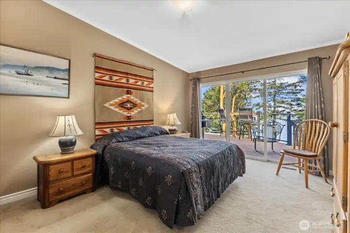 Second Primary bedroom, with deck access and on-suite bathroom. Second Primary bedroom, with deck access and on-suite bathroom.