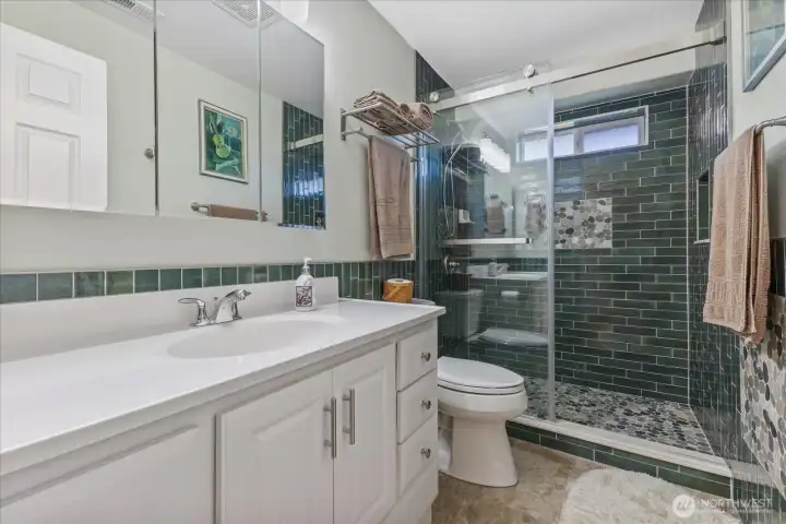 Newer lower level guest bath. Newer lower level guest bath.