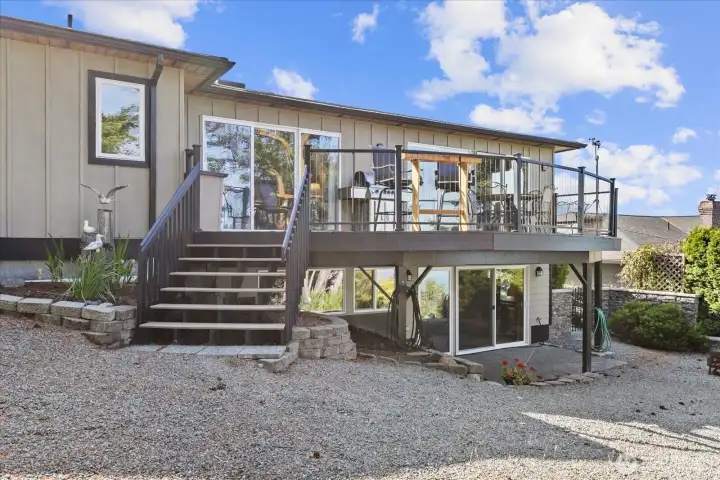 View from back yard of large entertainment size deck. View from back yard of large entertainment size deck.