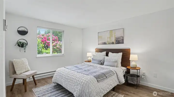 Retreat to the primary bedroom with a walk-in closet.