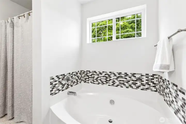 Soaking tub and shower.