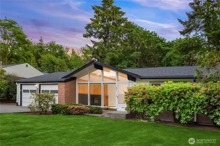 Mid-Century Modern Style with New Roof and Fresh Paint in and Out.
