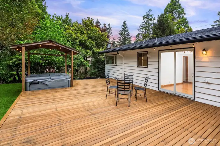 Sliding Glass door off dining area makes entertaining an ease.