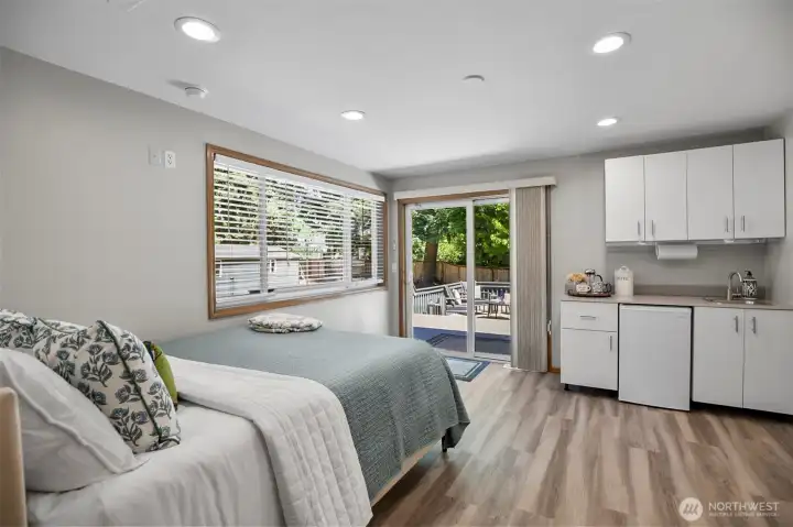 Main Floor Bedroom with Ensuite Bathroom and Wet Bar Main Floor Bedroom with Ensuite Bathroom and Wet Bar