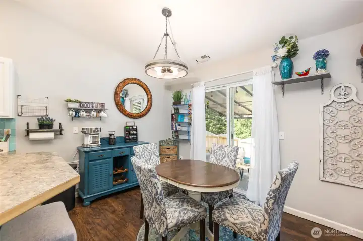 Dining Area with Glass Door to Patio