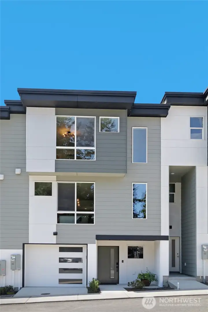 Welcome to Donati, a community of new townhomes where modern living is made affordable! Photo is the Aurora plan from a past plat.
