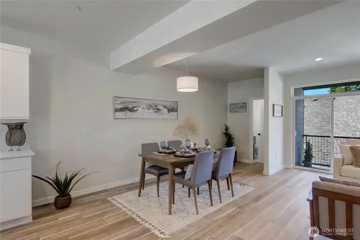 The spacious dining room can easily accommodate a bigger table for large gatherings.