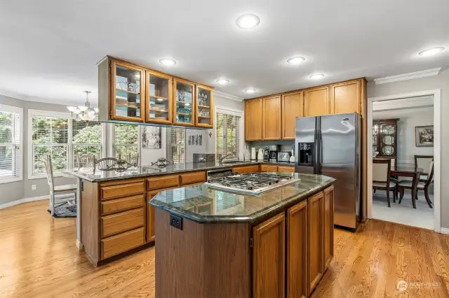 Spacious kitchen with updated granite counters and appliances