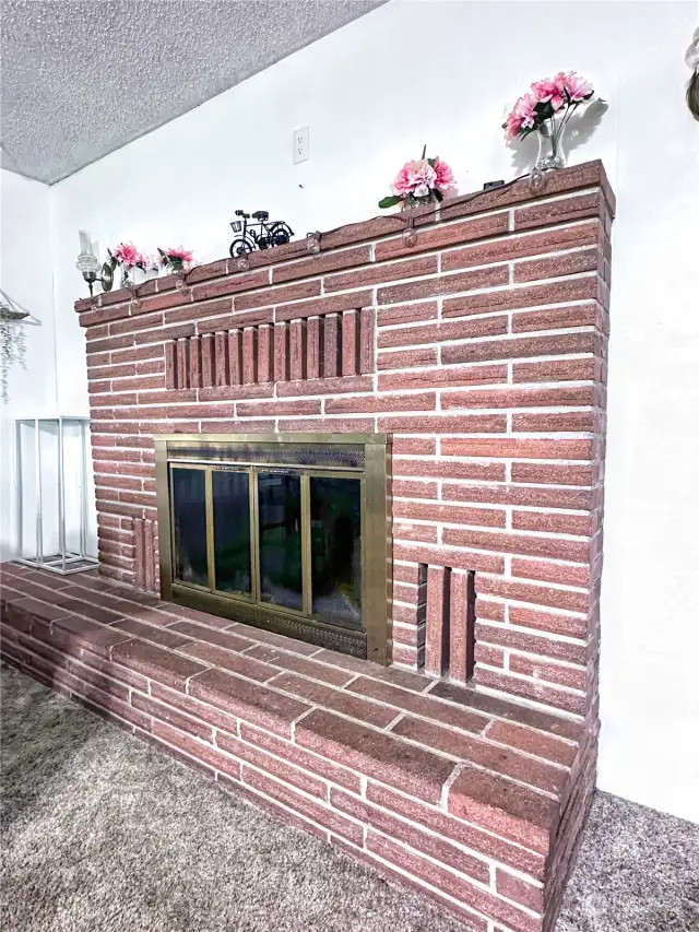 Brick wood burning fireplace