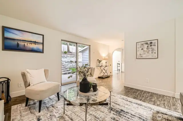 Sliders off the family room lead to the deck and terraced backyard.