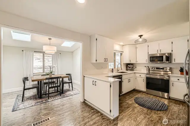 The dining room is easily accessible from the kitchen.