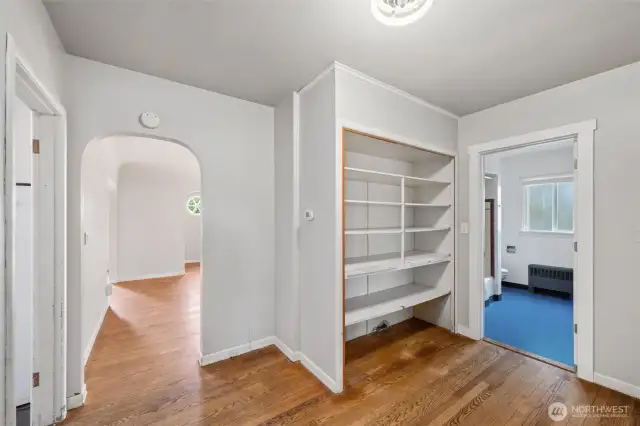 The bedroom hallways is accessible from the kitchen and living room area.