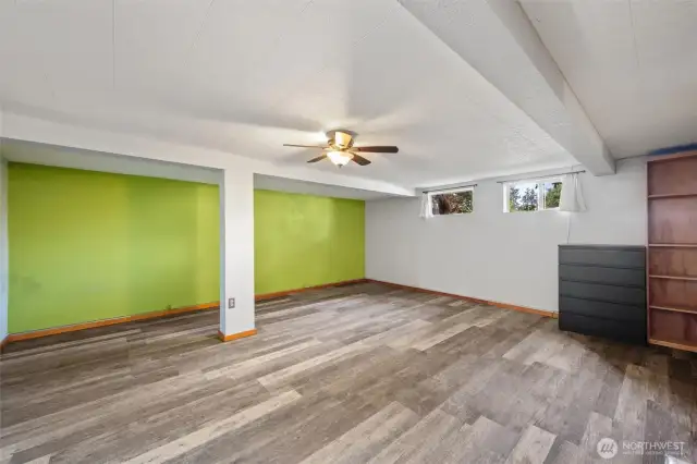 Large downstairs family/rec room in the basement suite.