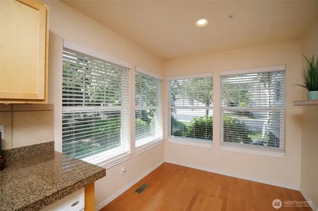 The breakfast nook could also be a reading room or painting studio.  So many windows offer pleasant breezes and natural light.