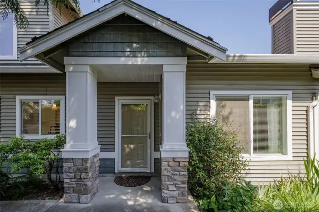 Covered front entry offers protection to you and your guests. No steps.