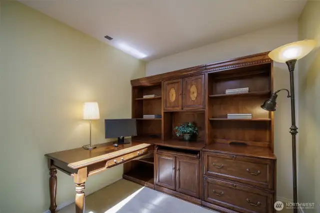 Upstairs loft den with skylight .