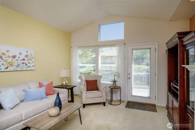 Vaulted ceilings and large windows.