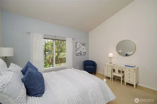 Vaulted ceilings and a view of the garden make this a tranquil suite.