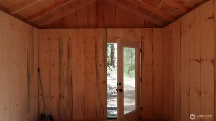 Front door to this amazing shed. look at all the pine wood the smell divine you will fall in love with this one.