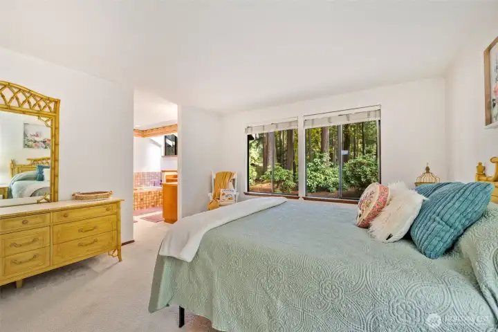 Primary bedroom en-suite. Bedroom, bathroom and closet all in one suite.