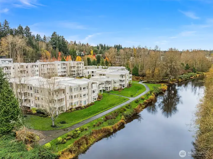 Ground floor, end unit offers fabulous, unobstructed views of river, woods and abundant wildlife.
