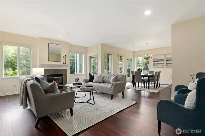 Open concept living room with lovely gas fireplace.