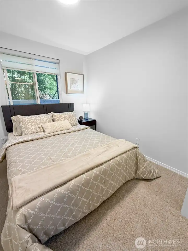 The bedroom has a bump-out on one side.