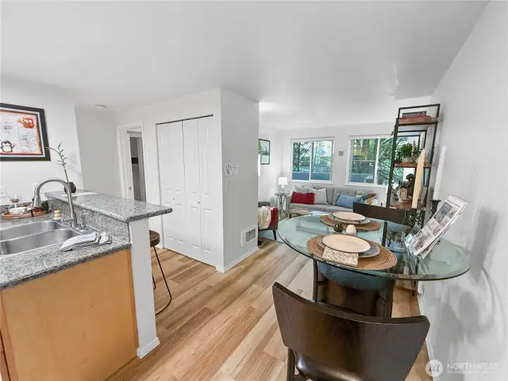 This is a view of the condo from in front of the laundry closet / from the corner of the dining room.