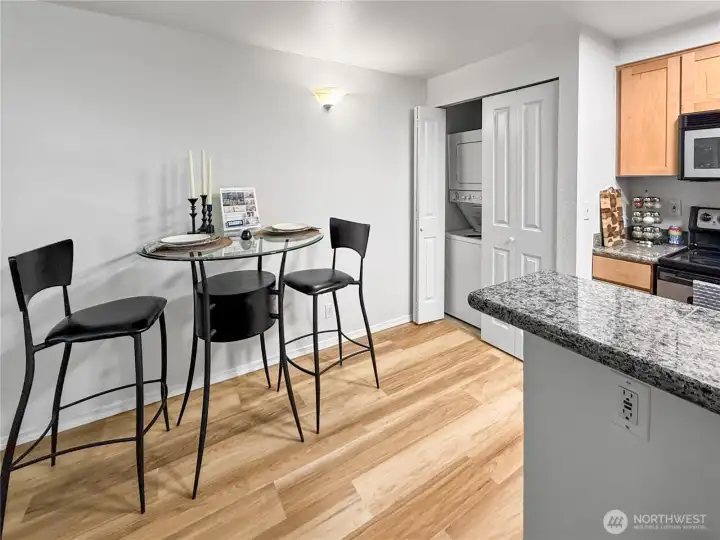The in-unit washer and dryer are located in the laundry closet between the kitchen and dining room. The new(er) water heater is in the same closet.