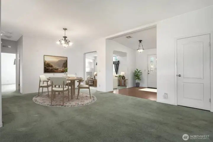 Formal dining or flex area just off the main entry opens to kitchen and family room