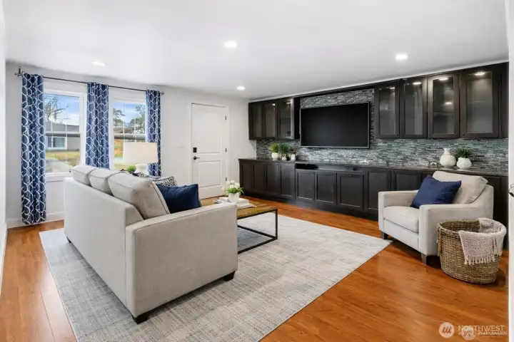 Virtually staged Living room Built in cabinets are there.