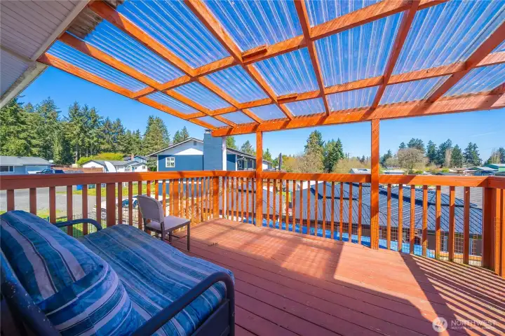 Covered deck off living room upstairs