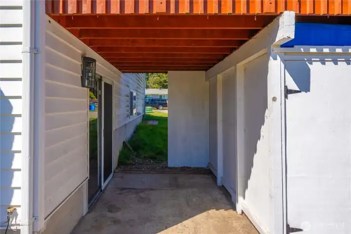Covered quiet area through downstairs sliding door.