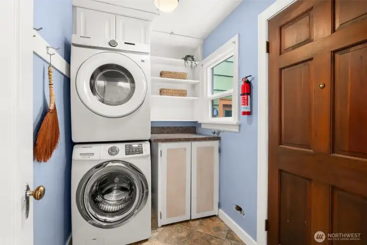 Laundry Room w/ access to back yard. and outbuildings.