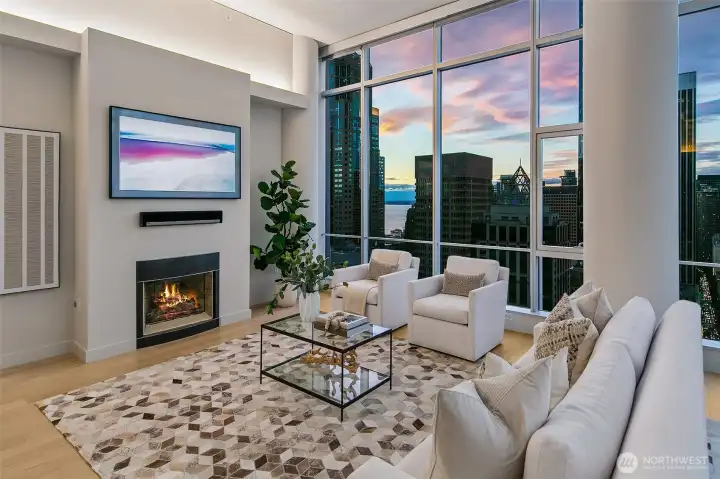 12 ft floor to ceiling windows wrap this stunning corner home