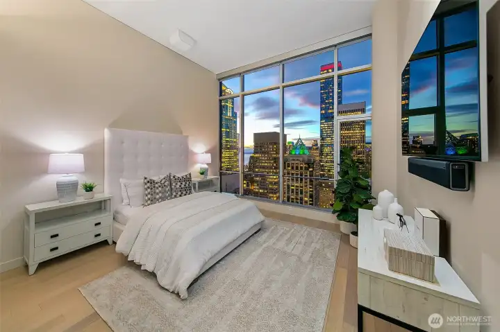 execeptional primary with 12 ft floor to ceiling glass -