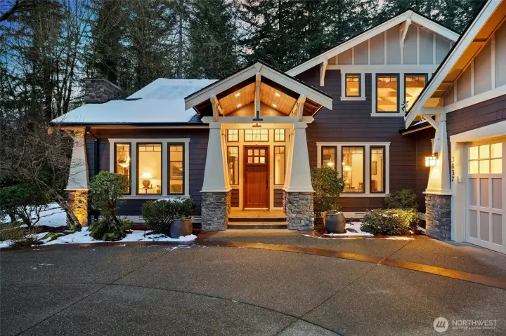 Impressive entryway flanked by stone columns