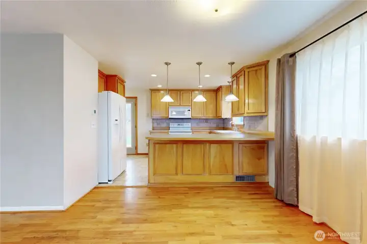 Dining area looking into kitchen