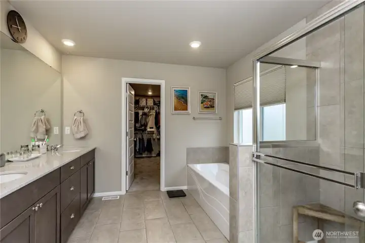 Primary bathroom with HUGE walk in closet