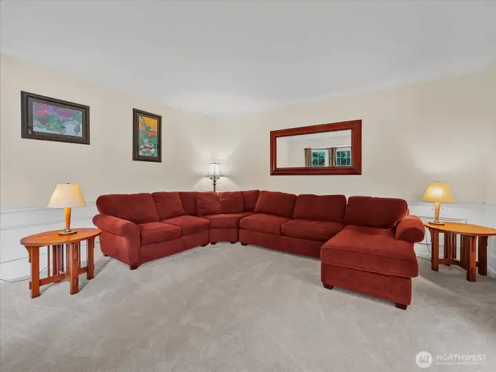 Large formal dining room with bay window.