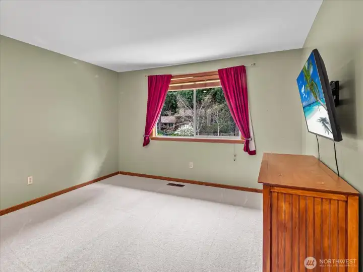 2nd bedroom upstairs, view of backyard.