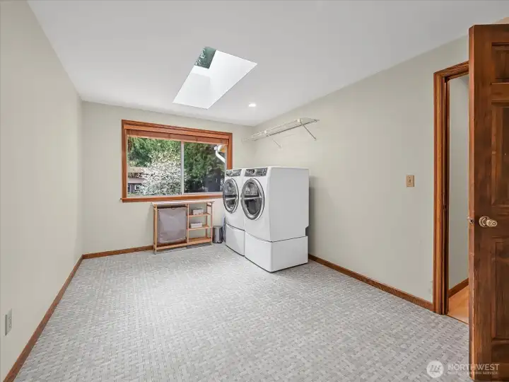 Utility room with lots of space on the upper floor.