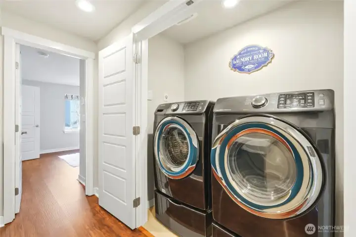 Hidden in a closet are the full-size high-end washer and dryer. Hidden in a closet are the full-size high-end washer and dryer.