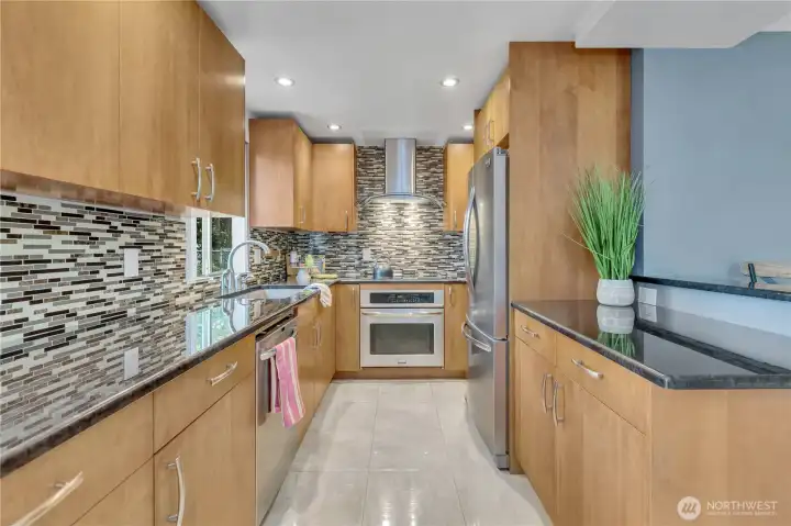 The remodeled kitchen offers functionality and convenience for everyday cooking and entertaining. The remodeled kitchen offers functionality and convenience for everyday cooking and entertaining.