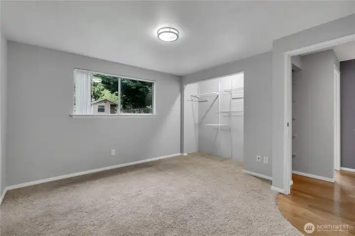 The spacious primary bedroom provides a peaceful retreat with convenient access to the home's updated bathrooms. The spacious primary bedroom provides a peaceful retreat with convenient access to the home's updated bathrooms.
