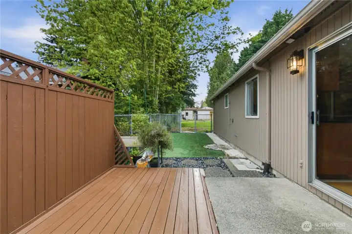 The expansive patio creates the ideal space for summer BBQs, morning coffee, or evening gatherings. The expansive patio creates the ideal space for summer BBQs, morning coffee, or evening gatherings.