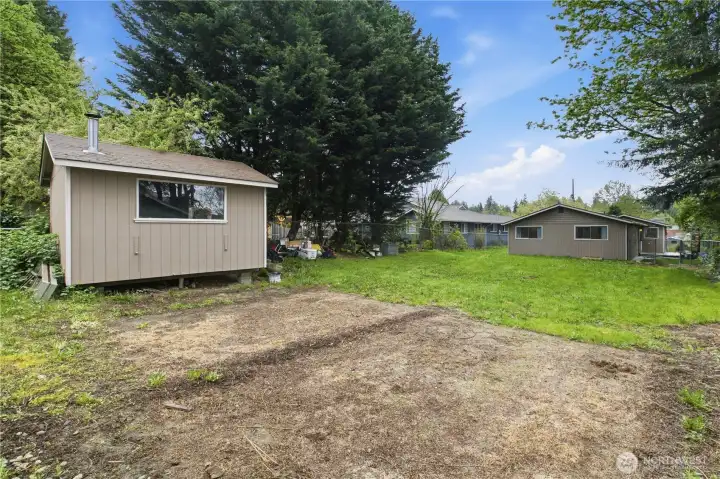 The storage shed provides extra space for tools, gardening supplies, and seasonal equipment. The storage shed provides extra space for tools, gardening supplies, and seasonal equipment.