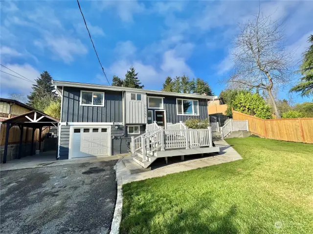 Spacious front yard for various uses and privacy.