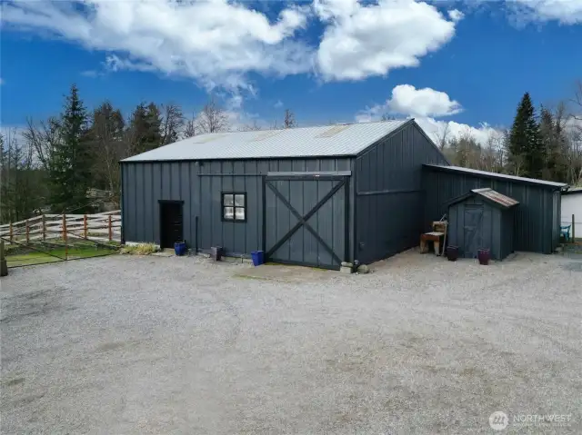 Exterior of barn with full circular turn around & RV parking.